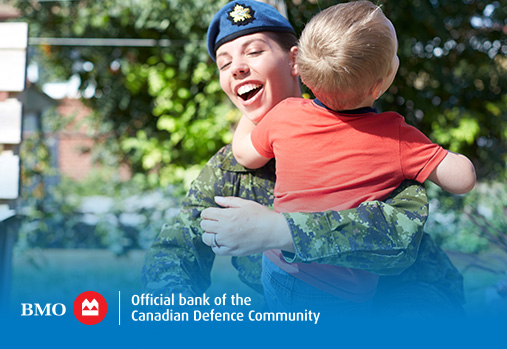 Canadian Defence Member carrying a child