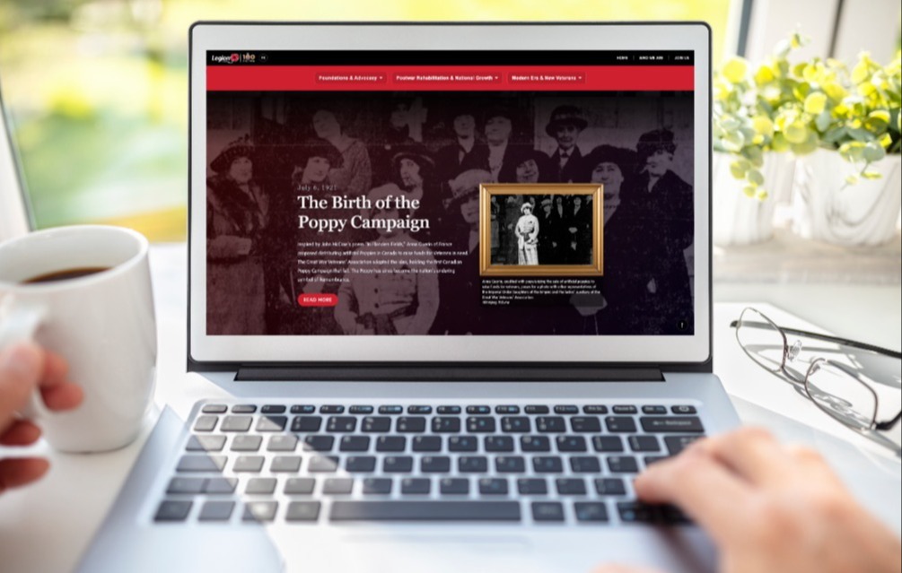 Open laptop with a page from the Legion history website