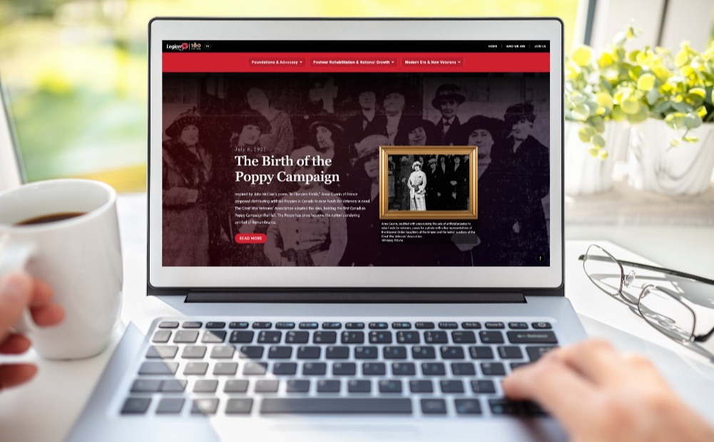 An opened laptop displaying a page from the Legion history website